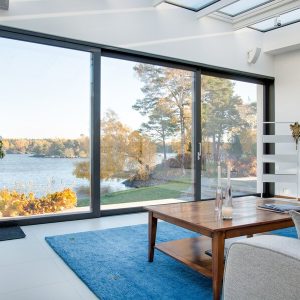 beautiful-view-blue-lake-captured-from-inside-villa_181624-10734